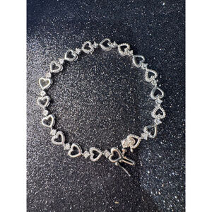 Sterling Silver and Natural Diamond Heart Bracelet. 7.5”
